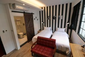 Postel nebo postele na pokoji v ubytování Pinestone Inn