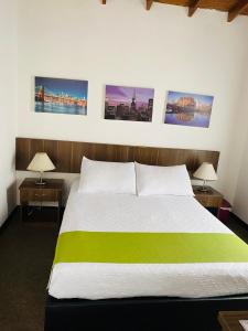 Postel nebo postele na pokoji v ubytování Hotel del Parque Confort LaCeja