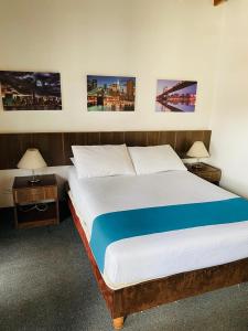 Postel nebo postele na pokoji v ubytování Hotel del Parque Confort LaCeja