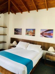 Postel nebo postele na pokoji v ubytování Hotel del Parque Confort LaCeja