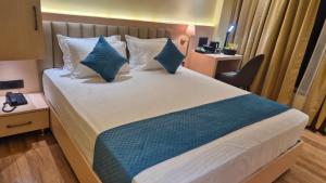 Hotel Central Tree客房内的一张或多张床位