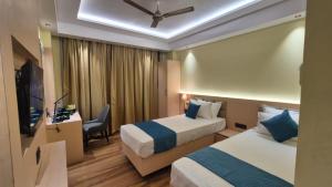 Hotel Central Tree客房内的一张或多张床位
