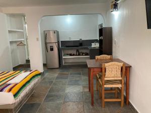 Kuchyň nebo kuchyňský kout v ubytování hotel las olas zicatela