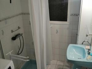 a bathroom with a shower and a toilet and a sink at Maison à Noirmoutier proche plage, animaux admis - FR-1-823-34 in Noirmoutier-en-l'lle +2 photos