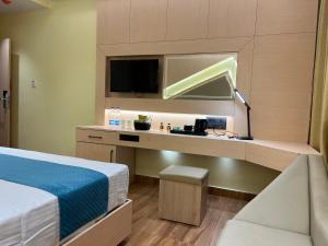Hotel Central Tree客房内的一张或多张床位