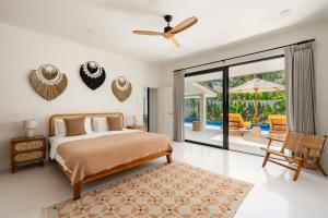 Ένα ή περισσότερα κρεβάτια σε δωμάτιο στο Villa Vedra - Elegant 3-Bedroom Pool Villa +62 φωτογραφίες