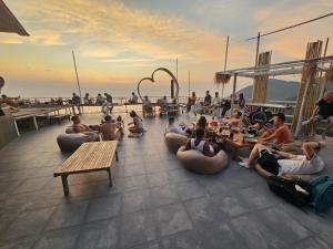 a group of people sitting on the deck of a cruise ship at Exotic Koh Tao in Ko Tao