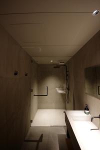 a bathroom with a shower and a sink at KITOW private villa in Awaji +18 photos