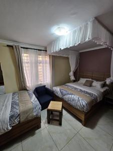 Uma cama ou camas num quarto em Big Tusks Hotel, Marsabit