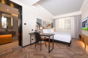 Ibis Styles Hotel - Xi'an Big Wild Goose Pagoda Historical Museum Branch 객실 침대