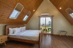 Postel nebo postele na pokoji v ubytování Palasa by Aer Studio