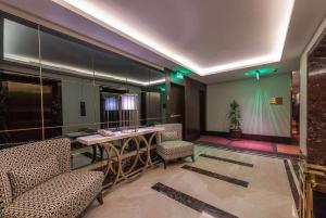Posezení v ubytování Ramada Hotel & Suites by Wyndham Al Qassim