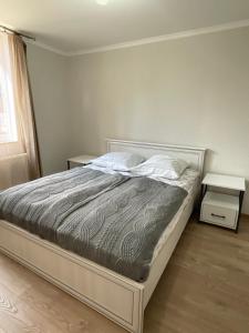 Postel nebo postele na pokoji v ubytování Apartment Oxalis
