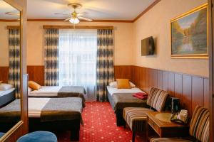 Voodi või voodid majutusasutuse Hansa Hotel toas