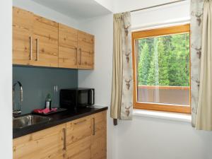 Kuchyň nebo kuchyňský kout v ubytování Apartment in Navis near Berger Alm Ski Resort