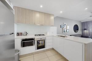 Η κουζίνα ή μικρή κουζίνα στο Charming Hamilton Retreat +10 φωτογραφίες