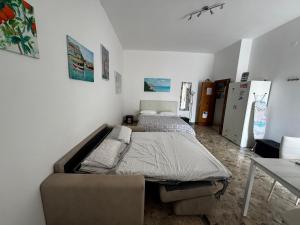 A bed or beds in a room at 6 Civico d arte Gargano home