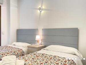 Postel nebo postele na pokoji v ubytování VH CostaBlanca - APARTAMENTO MILOS