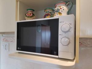 Kuchyň nebo kuchyňský kout v ubytování Penthouse Modena