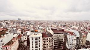 an aerial view of a city with buildings at The Green Park Taksim in Istanbul