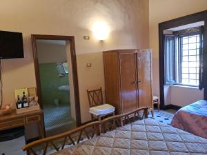 Postel nebo postele na pokoji v ubytování Agriturismo Montecorona