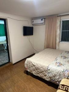 Ένα ή περισσότερα κρεβάτια σε δωμάτιο στο Moreme dom