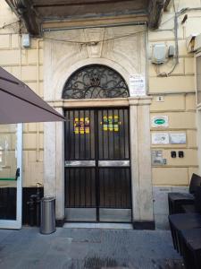 a large door to a building with at Matt house in La Spezia