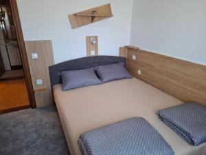 Katil atau katil-katil dalam bilik di Apartman Niko