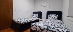 Posteľ alebo postele v izbe v ubytovaní Apartman Jelacic Vinkovci