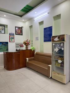 a waiting room with a drink machine in it at Thinh Khang Hotel Vung Tau in Vung Tau
