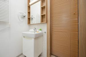 Koupelna v ubytování Business Studio Apartments Wolska by Noclegi Renters