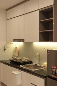 Η κουζίνα ή μικρή κουζίνα στο Hase Homestay