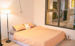 Ένα ή περισσότερα κρεβάτια σε δωμάτιο στο Hase Homestay