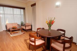 Area soggiorno di Airport Hotel
