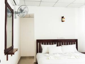 Letto o letti in una camera di Better Yala Home