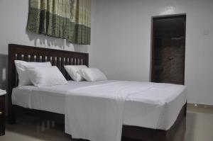 Letto o letti in una camera di Better Yala Home