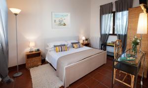 Postel nebo postele na pokoji v ubytování B&B Canneto Beach + 35 fotografií