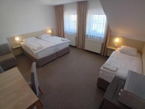 Letto o letti in una camera di Hotel u Budvaru