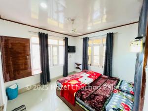 Katil atau katil-katil dalam bilik di Hotel Chachoo Palace