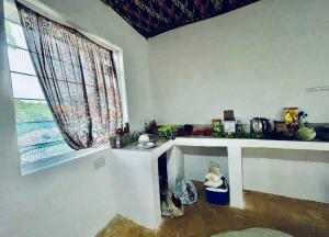 Příslušenství pro přípravu čaje a kávy v ubytování House with beautiful garden for rent in Kizimkazi