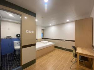 Postel nebo postele na pokoji v ubytování Comfort Hostel