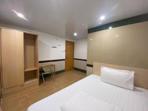 Postel nebo postele na pokoji v ubytování Comfort Hostel