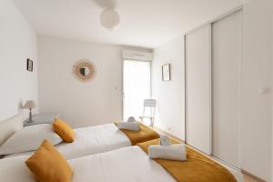 Voodi või voodid majutusasutuse La Cabine du Val - A proximité de la Plage toas