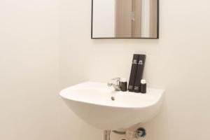 Φωτογραφία από το άλμπουμ του Warm and Cozy Living 3BR at Meikarta Apartment By Travelio σε Cikarang