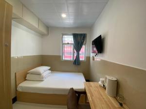 Postel nebo postele na pokoji v ubytování Comfort Hostel