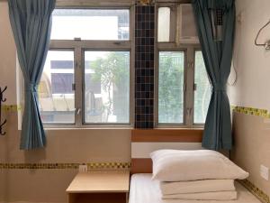 Postel nebo postele na pokoji v ubytování Comfort Hostel