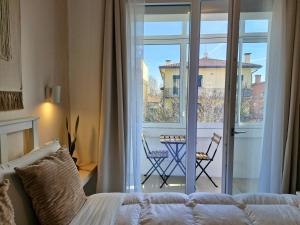 Postel nebo postele na pokoji v ubytování Stazione Rooms