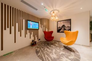 TV a/nebo společenská místnost v ubytování 080 Transit Hotel, T2