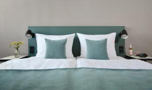 Voodi või voodid majutusasutuse Living Hotel Kaiser Franz Joseph toas