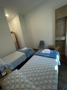 Posteľ alebo postele v izbe v ubytovaní Casa Diocesana VIA LUCIS